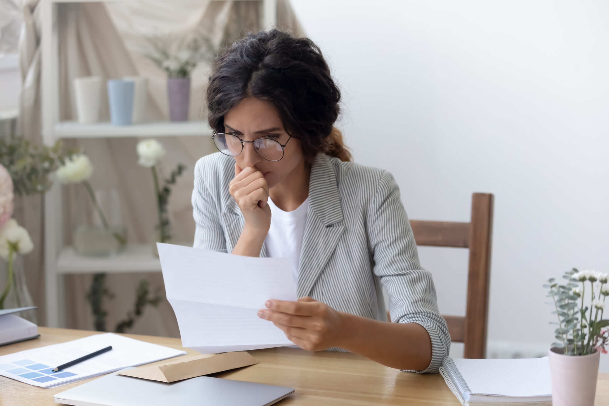 Pensive Caucasian woman feel frustrated reading letter