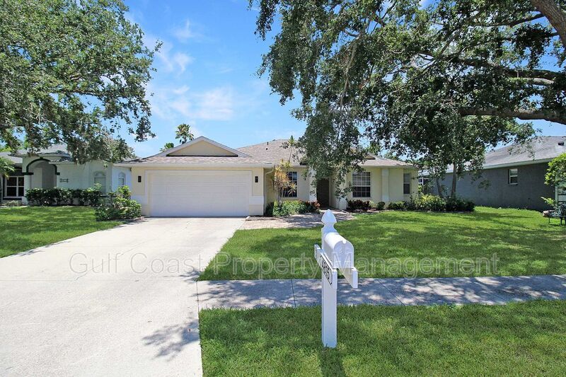 Annual rental: Spacious 3BR/2BA Creekwood Home with Office, Screened Lanai, EV Charger & Resort-Style Amenities property image