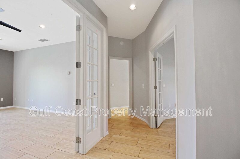 Annual rental: Spacious 3BR/2BA Creekwood Home with Office, Screened Lanai, EV Charger & Resort-Style Amenities property image