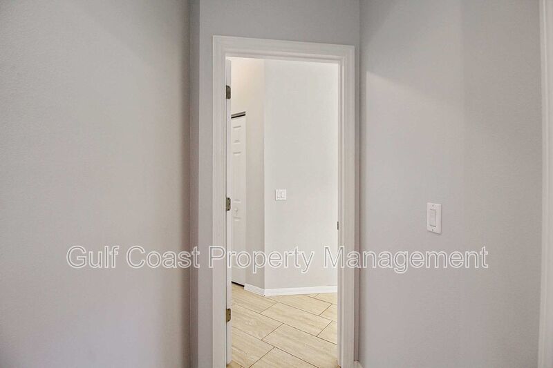 Annual rental: Spacious 3BR/2BA Creekwood Home with Office, Screened Lanai, EV Charger & Resort-Style Amenities property image