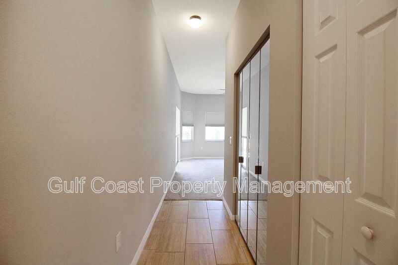 Annual rental: Spacious 3BR/2BA Creekwood Home with Office, Screened Lanai, EV Charger & Resort-Style Amenities property image
