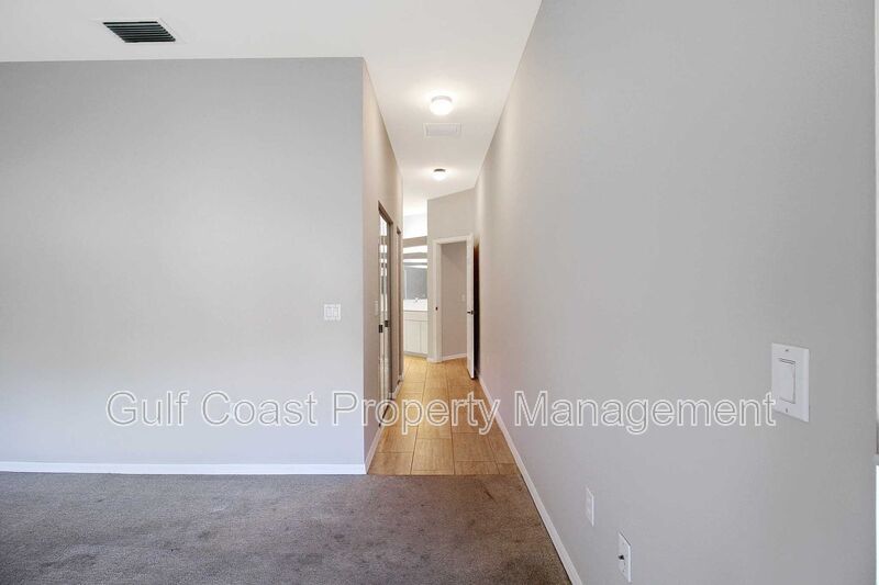 Annual rental: Spacious 3BR/2BA Creekwood Home with Office, Screened Lanai, EV Charger & Resort-Style Amenities property image