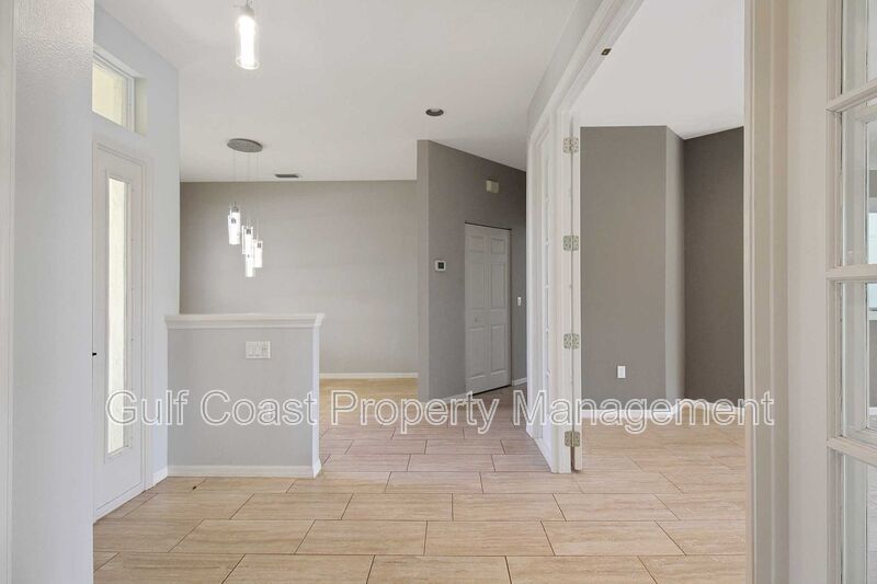 Annual rental: Spacious 3BR/2BA Creekwood Home with Office, Screened Lanai, EV Charger & Resort-Style Amenities property image