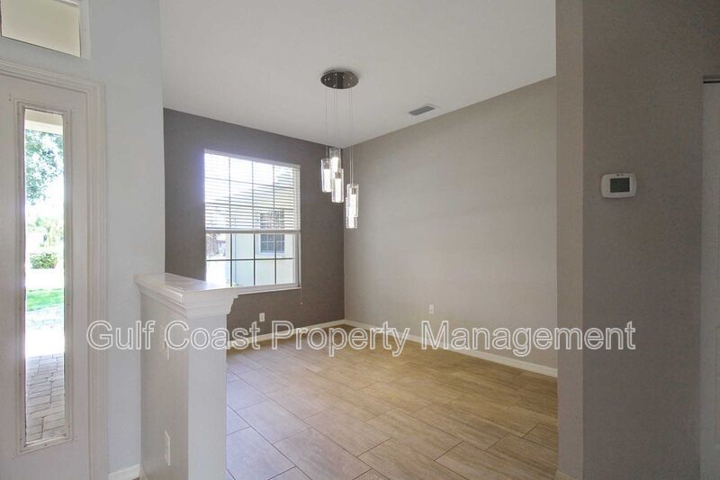 Annual rental: Spacious 3BR/2BA Creekwood Home with Office, Screened Lanai, EV Charger & Resort-Style Amenities property image