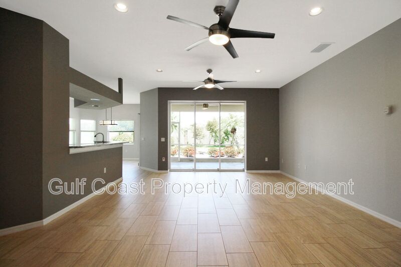 Annual rental: Spacious 3BR/2BA Creekwood Home with Office, Screened Lanai, EV Charger & Resort-Style Amenities property image