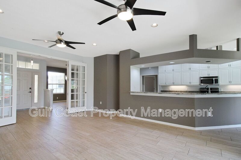 Annual rental: Spacious 3BR/2BA Creekwood Home with Office, Screened Lanai, EV Charger & Resort-Style Amenities property image