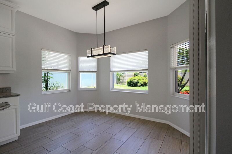 Annual rental: Spacious 3BR/2BA Creekwood Home with Office, Screened Lanai, EV Charger & Resort-Style Amenities property image