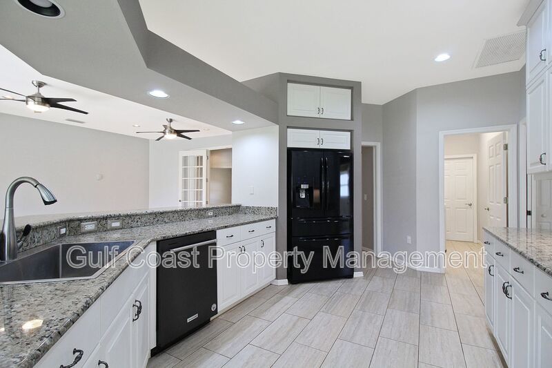 Annual rental: Spacious 3BR/2BA Creekwood Home with Office, Screened Lanai, EV Charger & Resort-Style Amenities property image