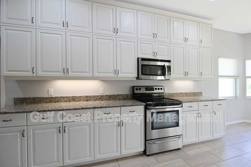 Annual rental: Spacious 3BR/2BA Creekwood Home with Office, Screened Lanai, EV Charger & Resort-Style Amenities property image
