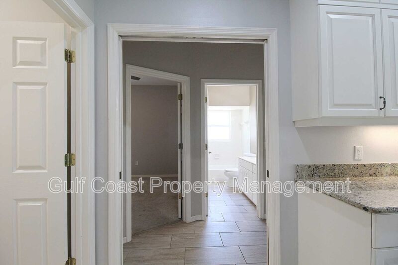 Annual rental: Spacious 3BR/2BA Creekwood Home with Office, Screened Lanai, EV Charger & Resort-Style Amenities property image