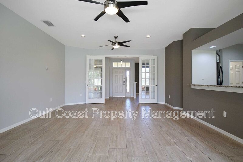 Annual rental: Spacious 3BR/2BA Creekwood Home with Office, Screened Lanai, EV Charger & Resort-Style Amenities property image