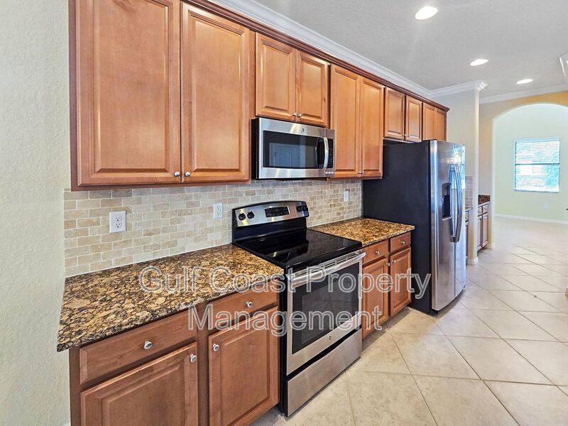 Resort-Style 4-Bedroom, 3full-Baths and 2-Half Baths Waterfront Pool Home in the Gated Community of River Strand property image