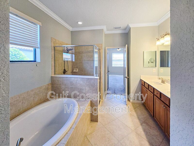 Resort-Style 4-Bedroom, 3full-Baths and 2-Half Baths Waterfront Pool Home in the Gated Community of River Strand property image