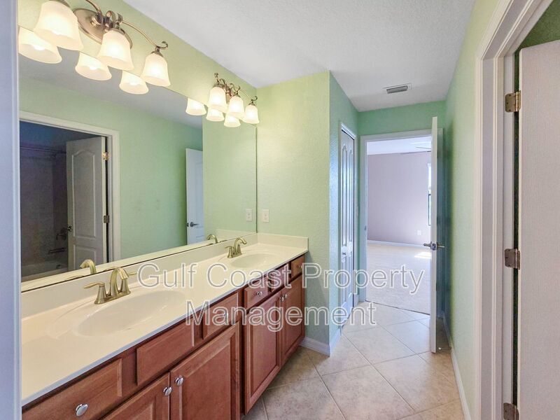 Resort-Style 4-Bedroom, 3full-Baths and 2-Half Baths Waterfront Pool Home in the Gated Community of River Strand property image