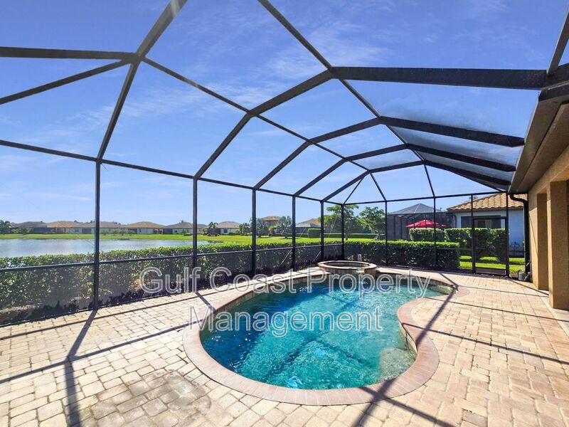 Resort-Style 4-Bedroom, 3full-Baths and 2-Half Baths Waterfront Pool Home in the Gated Community of River Strand property image