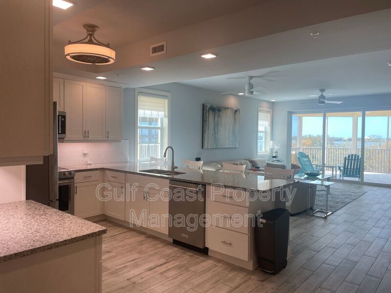 Coastal Luxury at Hidden Bay | 3BR Waterfront Condo with Bay Views property image