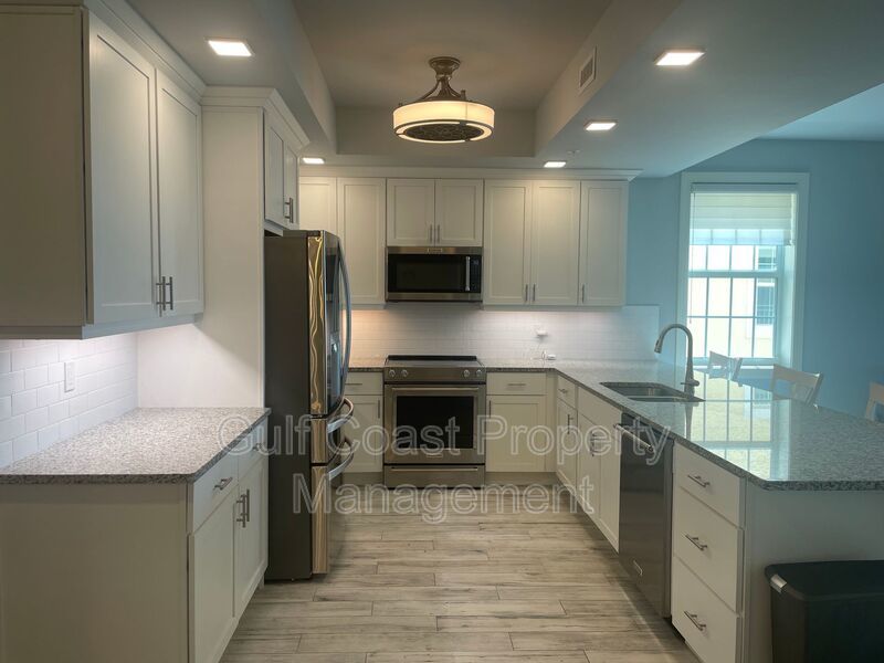 Coastal Luxury at Hidden Bay | 3BR Waterfront Condo with Bay Views property image