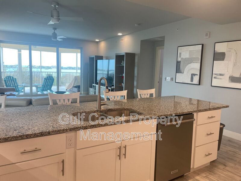 Coastal Luxury at Hidden Bay | 3BR Waterfront Condo with Bay Views property image