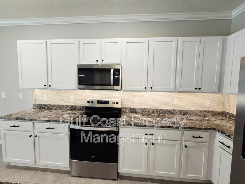 Gated 3 Bedroom, 2.5 Bath Townhome in Woodleaf Hammock | Stylish Living with Resort-Style Amenities property image