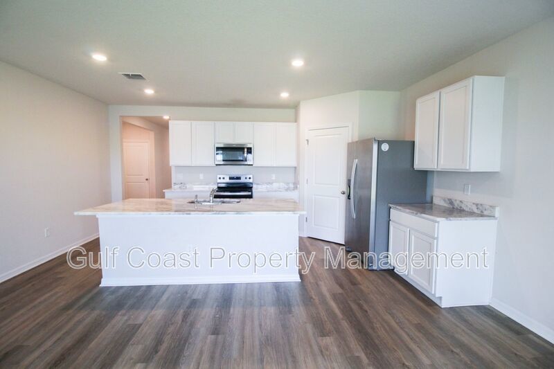 Annual Lakeview Retreat in Gated Solera – 4BR Home with Fenced Yard & Lake View property image