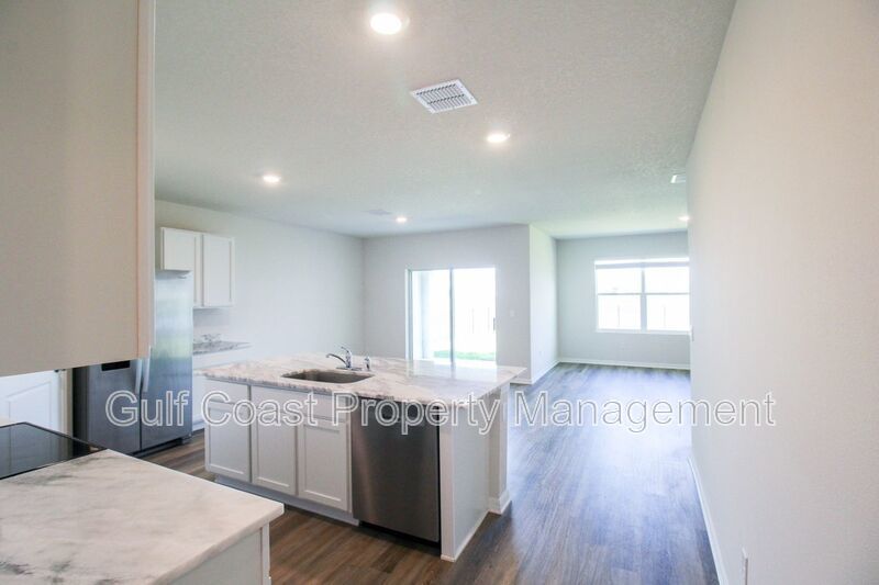 Annual Lakeview Retreat in Gated Solera – 4BR Home with Fenced Yard & Lake View property image