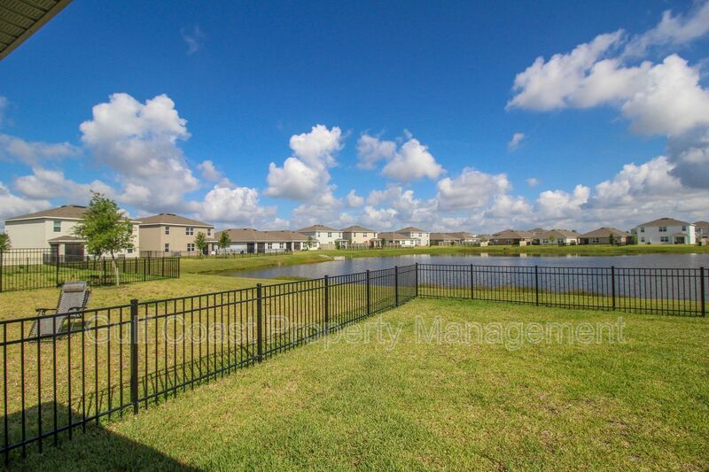 Annual Lakeview Retreat in Gated Solera – 4BR Home with Fenced Yard & Lake View property image