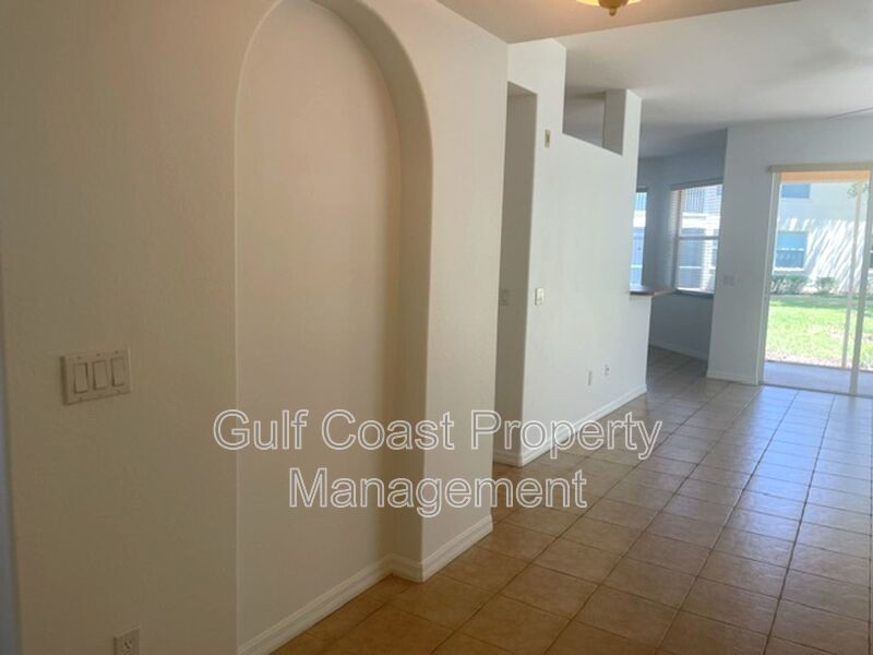 Elegant 3 Bedroom End-Unit Condo with Screened Lanai & Pond Views and A Private Garage property image