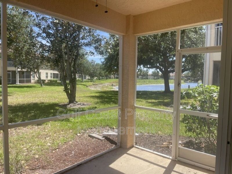 Elegant 3 Bedroom End-Unit Condo with Screened Lanai & Pond Views and A Private Garage property image