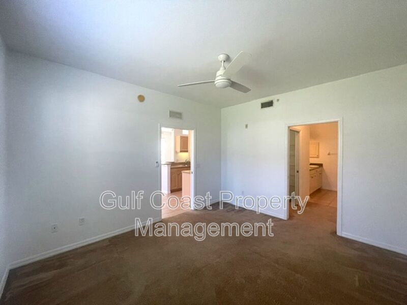 Elegant 3 Bedroom End-Unit Condo with Screened Lanai & Pond Views and A Private Garage property image