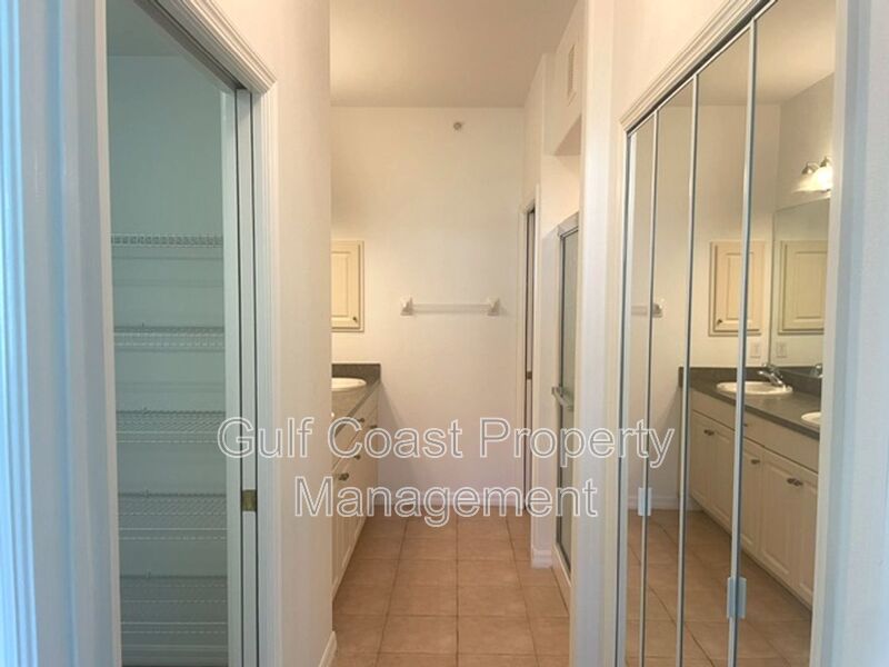 Elegant 3 Bedroom End-Unit Condo with Screened Lanai & Pond Views and A Private Garage property image