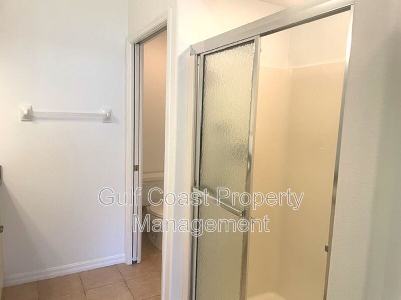 Elegant 3 Bedroom End-Unit Condo with Screened Lanai & Pond Views and A Private Garage property image
