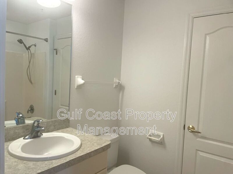 Elegant 3 Bedroom End-Unit Condo with Screened Lanai & Pond Views and A Private Garage property image