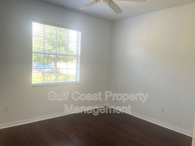 Elegant 3 Bedroom End-Unit Condo with Screened Lanai & Pond Views and A Private Garage property image