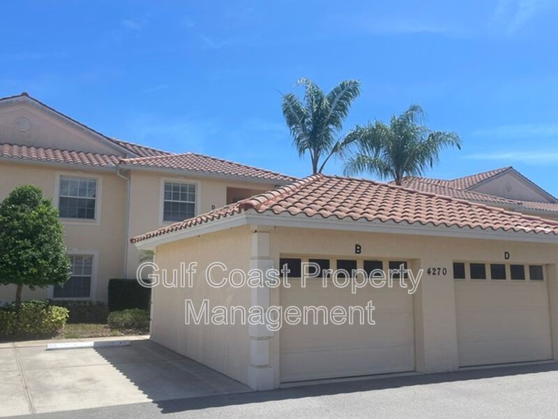 Elegant 3 Bedroom End-Unit Condo with Screened Lanai & Pond Views and A Private Garage property image
