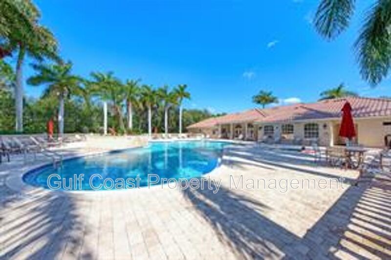 Elegant 3 Bedroom End-Unit Condo with Screened Lanai & Pond Views and A Private Garage property image
