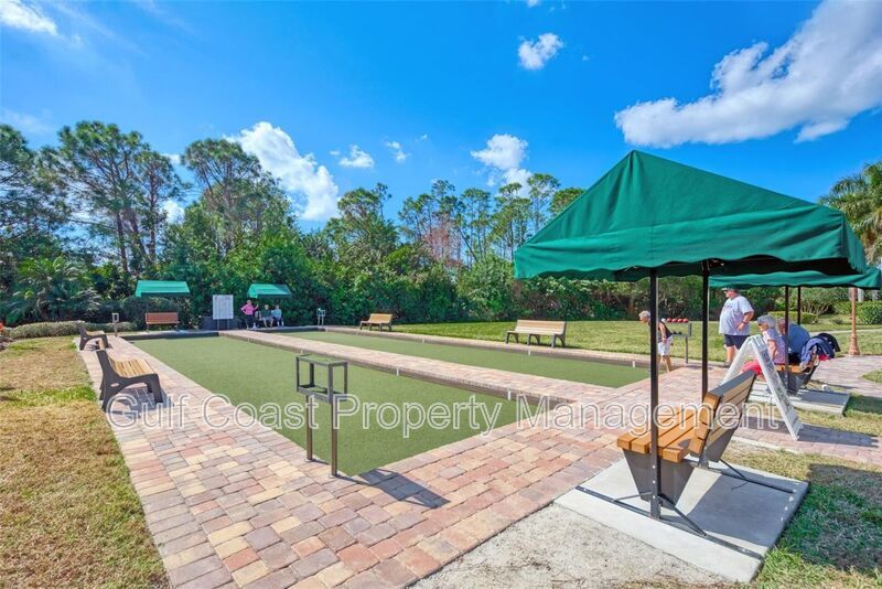 Elegant 3 Bedroom End-Unit Condo with Screened Lanai & Pond Views and A Private Garage property image