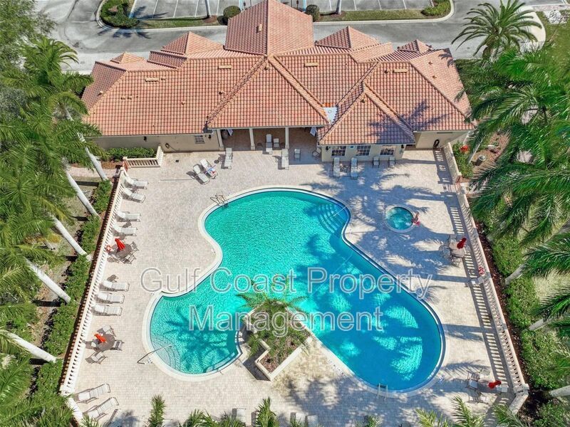 Elegant 3 Bedroom End-Unit Condo with Screened Lanai & Pond Views and A Private Garage property image