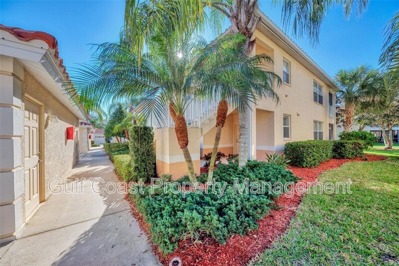 Elegant 3 Bedroom End-Unit Condo with Screened Lanai & Pond Views and A Private Garage property image