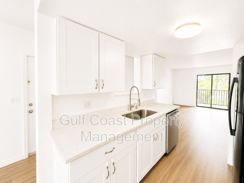 Updated 2-Bedroom Condo with Screened Lanai with water included. property image