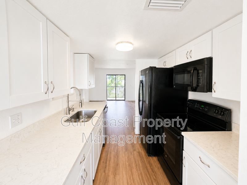 Updated 2-Bedroom Condo with Screened Lanai with water included. property image