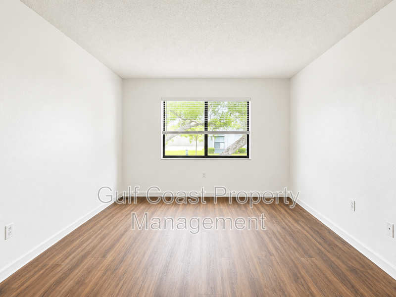 Updated 2-Bedroom Condo with Screened Lanai with water included. property image