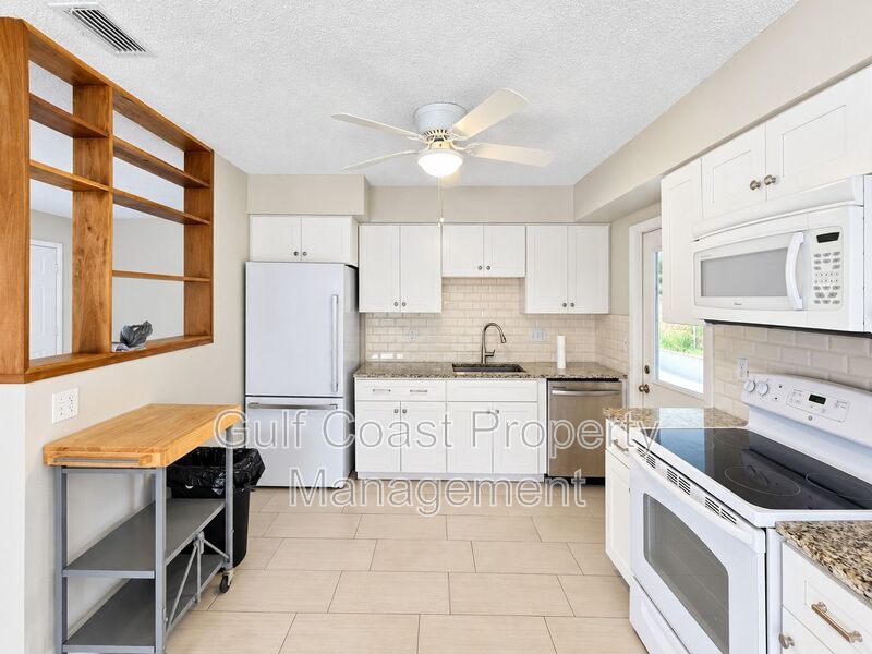 Beautifully Updated Annual Rental with 2 Bed, 2 Bath & Private Fenced Backyard Yard property image