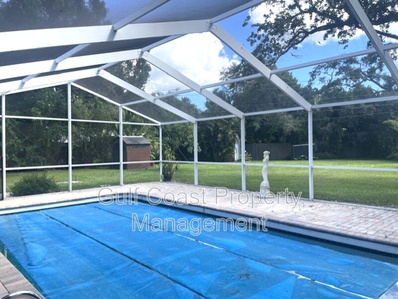 Spacious Furnished Pool Home with Oversized Yard, Mature Trees & RV/Boat Parking property image