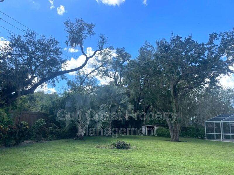 Spacious Furnished Pool Home with Oversized Yard, Mature Trees & RV/Boat Parking property image