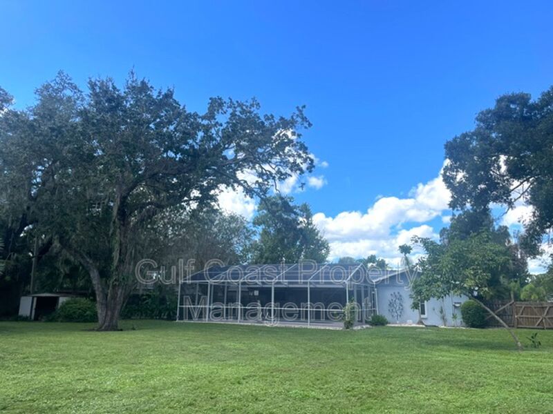 Spacious Furnished Pool Home with Oversized Yard, Mature Trees & RV/Boat Parking property image