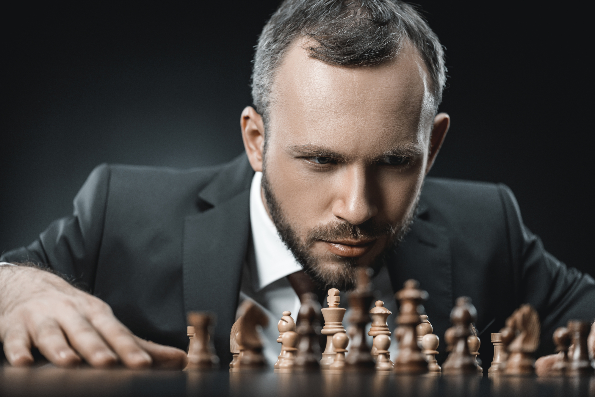 Pensive businessman and chess