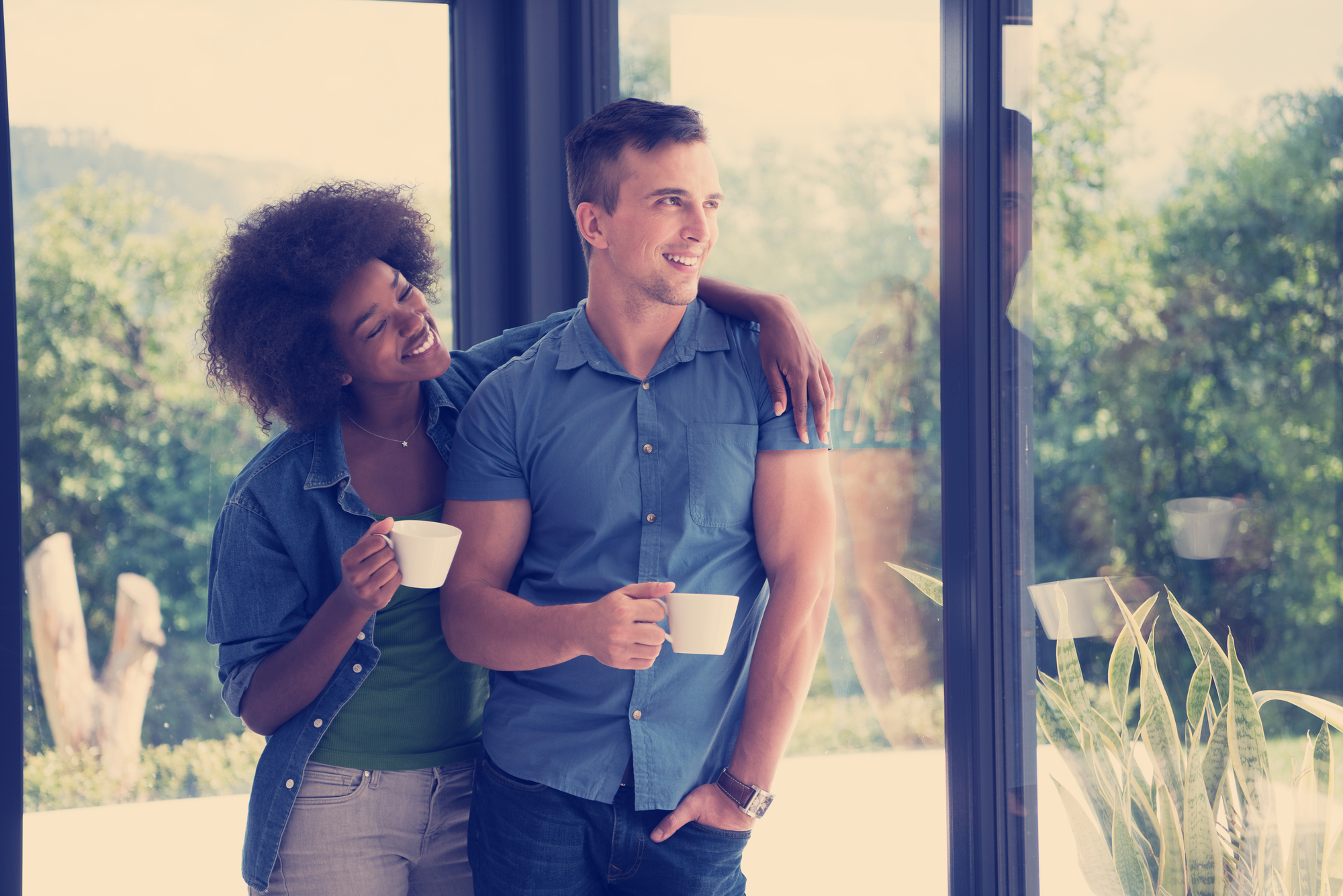 Romantic happy young couple relax at modern home indoors