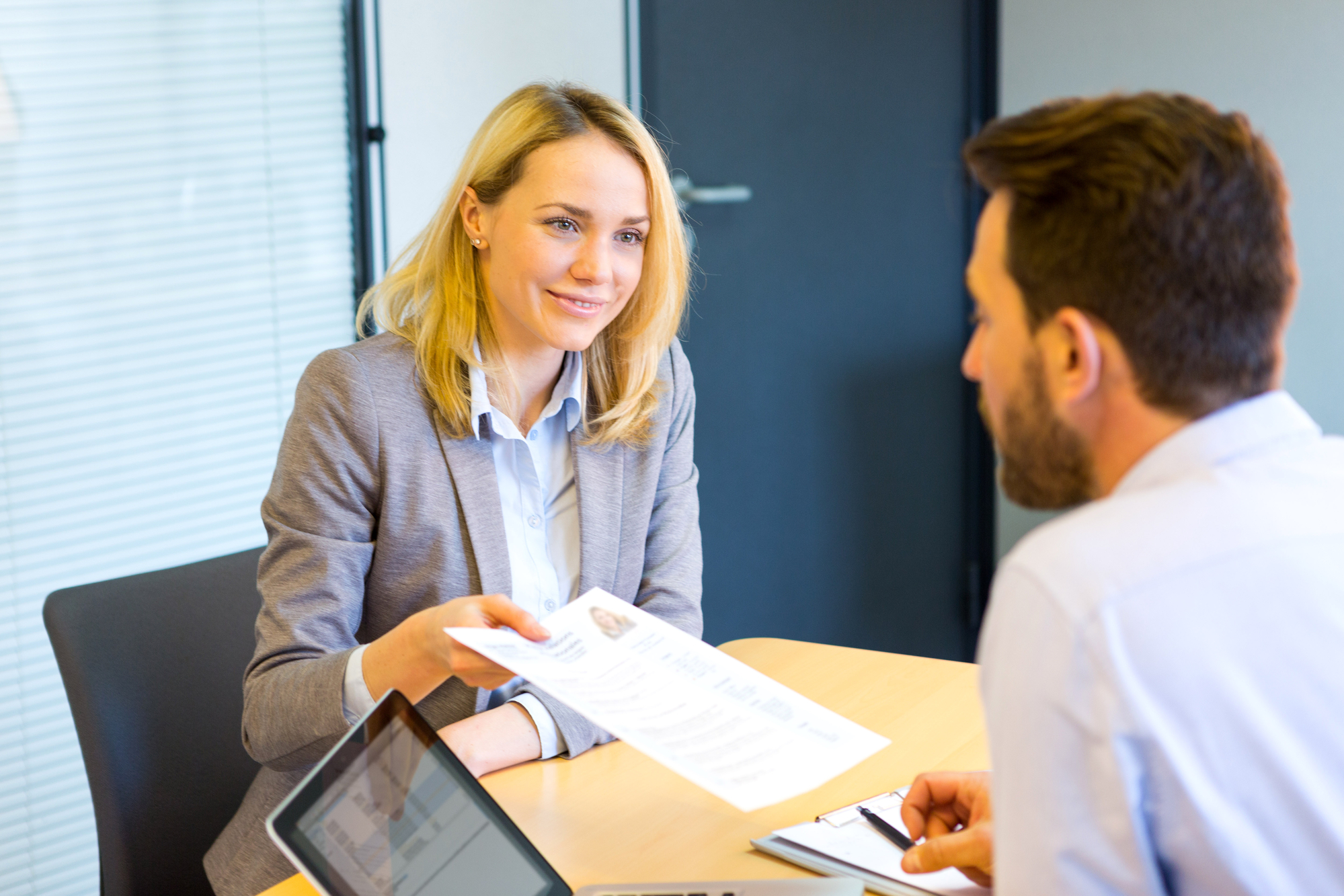 Young attractive woman during job interview